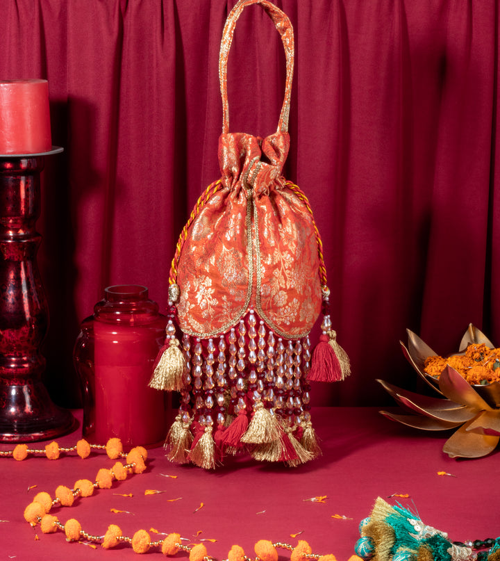 Orange Meera Tasseled Potli - Suave Bags  